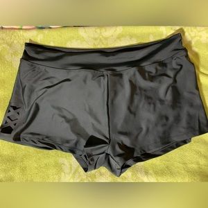 Never worn black swim shorts. Size L 12/14). Free Country.